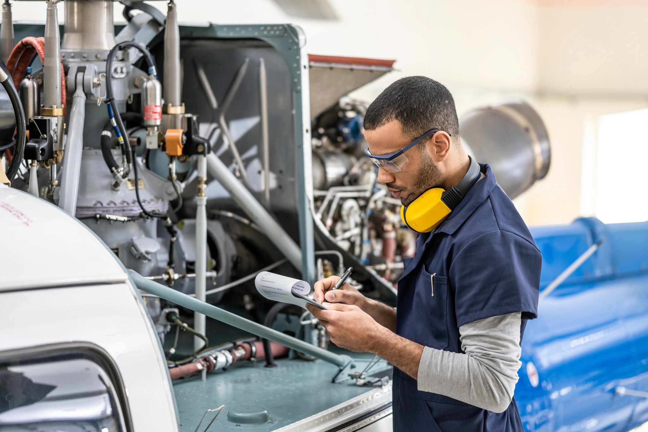 Electronics repair technician at work