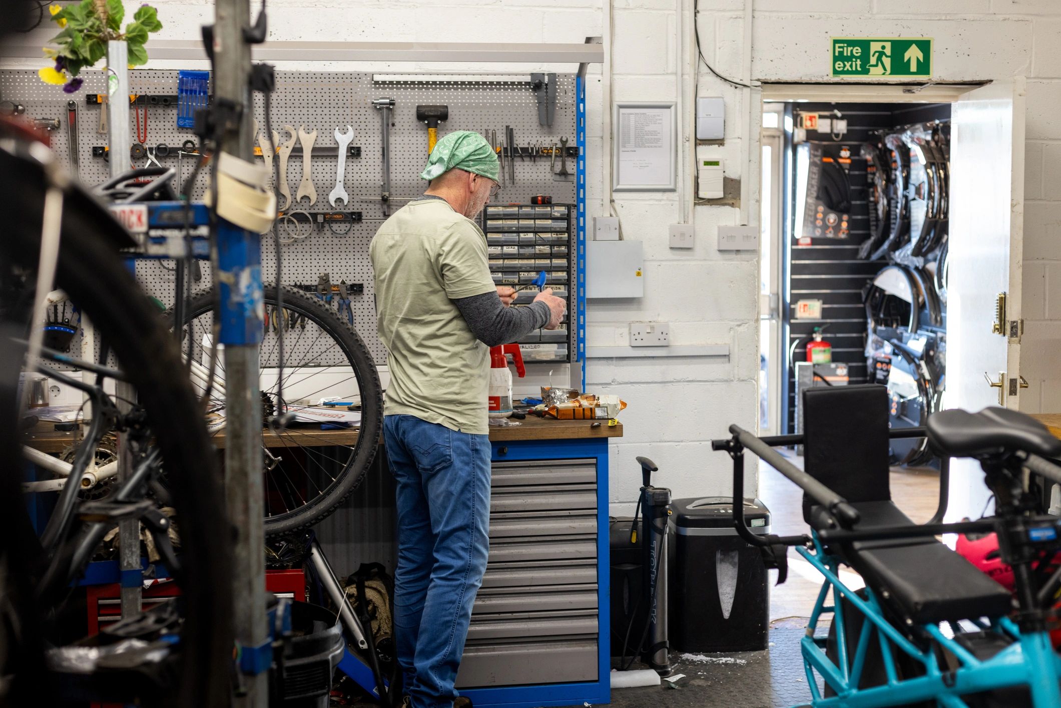 Repair technician working at a service bench